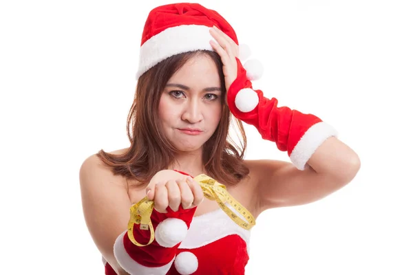 測定テープとアジアのクリスマス サンタ クロース女の子ダイエット. — ストック写真