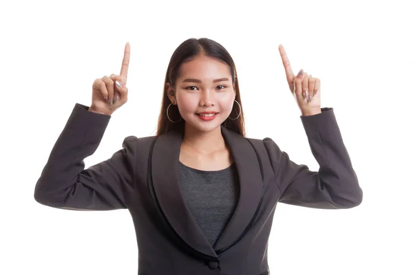 Junge asiatische Geschäftsfrau zeigen auf weiße Fläche. — Stockfoto