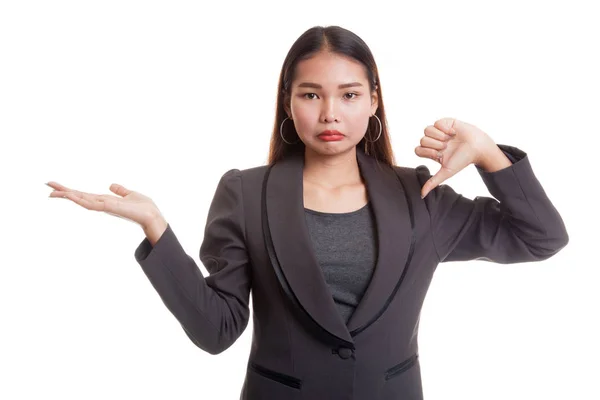 Young Asian woman show palm hand and thumbs down. — Stock Photo, Image