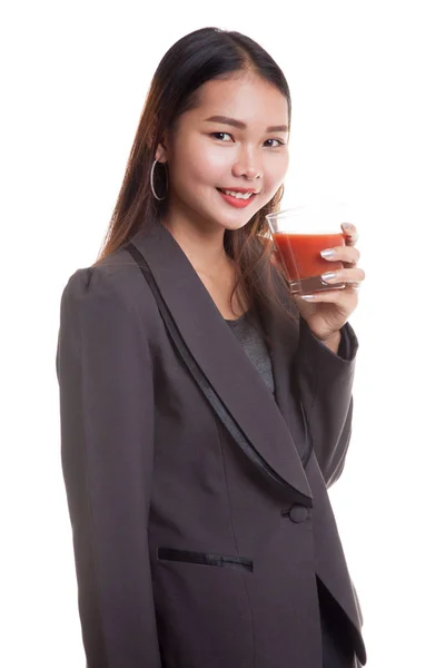 Unga asiatiska företag kvinna drink tomatjuice. — Stockfoto