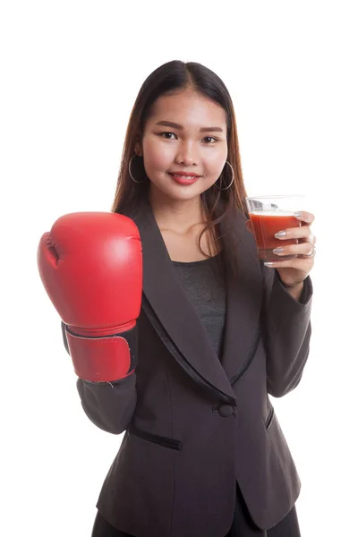 Young Asian business woman with tomato juice and boxing glove. — Stock Photo, Image