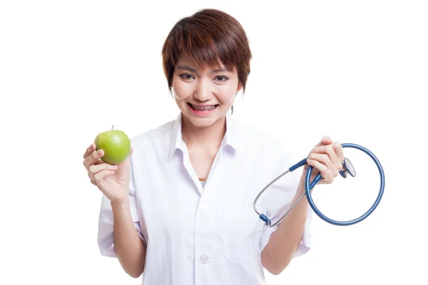 Young Asian female doctor hold  apple and stethoscope. — Stock Photo, Image