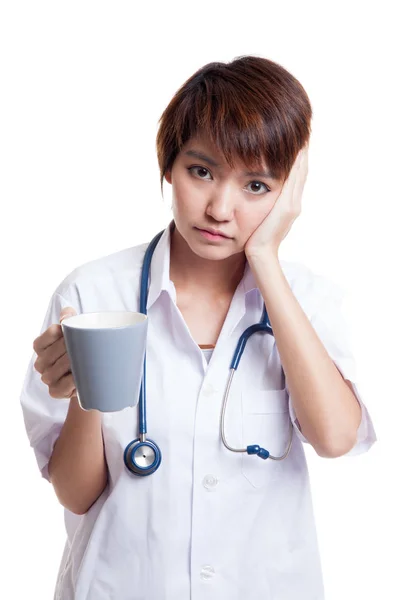 Asian young female doctor got headache. — Stock Photo, Image