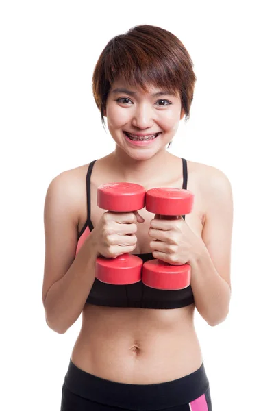 Beautiful Asian healthy girl exercise with dumbbell. — Stock Photo, Image