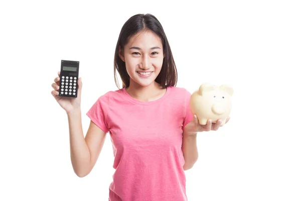 Asian business woman with calculator and piggy bank. — Stock Photo, Image