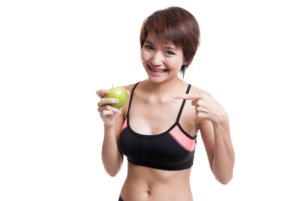 美しいアジアの健康的な女の子が赤いリンゴをポイントします。. — ストック写真