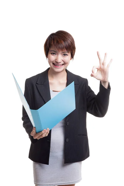 Young Asian working woman show OK with folder. — Stock Photo, Image