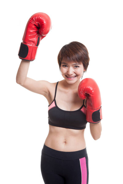 Beautiful healthy Asian girl with red boxing glove.