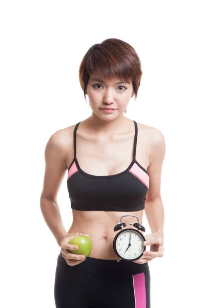 Schöne asiatische gesunde Mädchen mit Uhr und Apfel. — Stockfoto