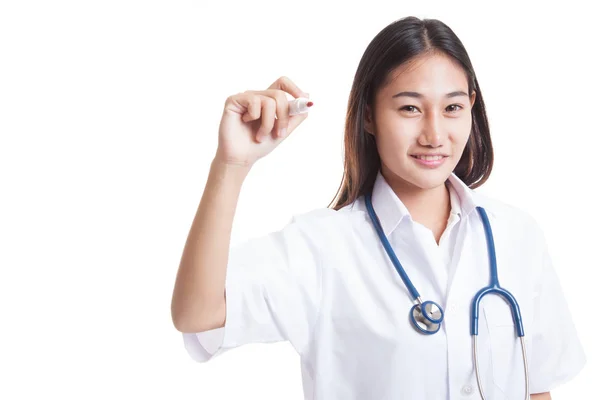 Young Asian female doctor write with a red marker. — Stock Photo, Image