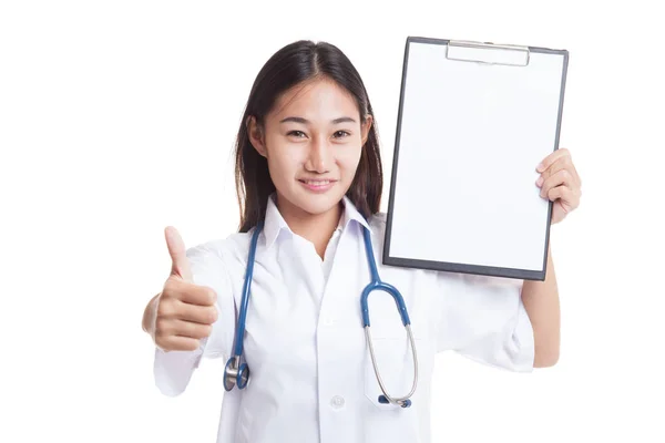 Young Asian female doctor thumbs up with a blank clipboard. — Stock Photo, Image