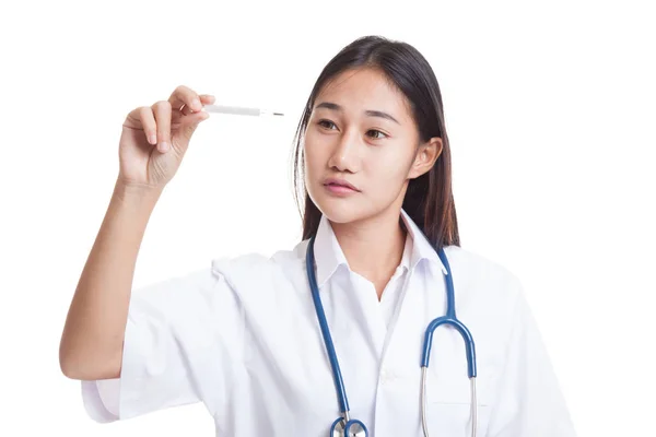 Young Asian female doctor  think with thermometer. — Stock Photo, Image