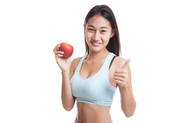 Beautiful Asian healthy girl thumbs up with red apple. — Stock Photo, Image