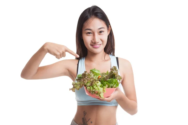 Hermosa chica sana asiática punto a la ensalada . — Foto de Stock