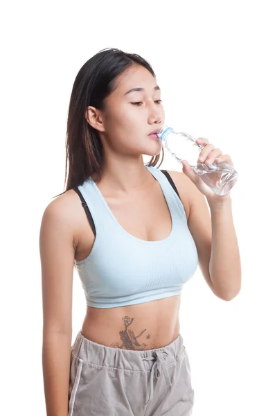 Beautiful Asian healthy girl with bottle of drinking water. — Stock Photo, Image