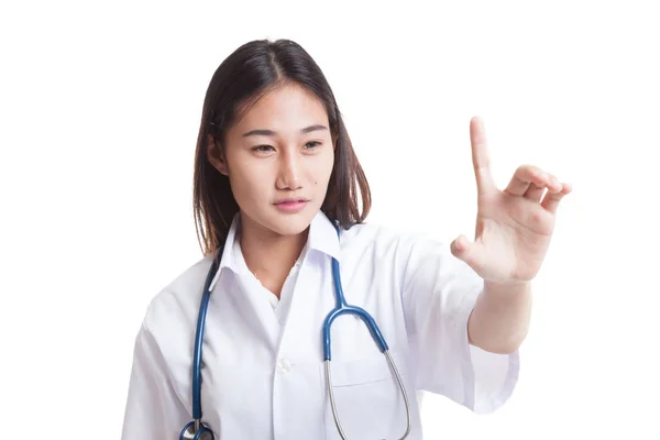 Junge asiatische Ärztin berühren einen Bildschirm. — Stockfoto