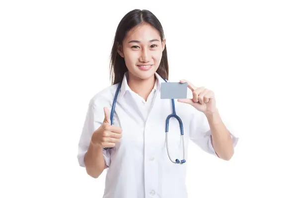 Asian young female doctor show thumbs up with blank card. — Stock Photo, Image