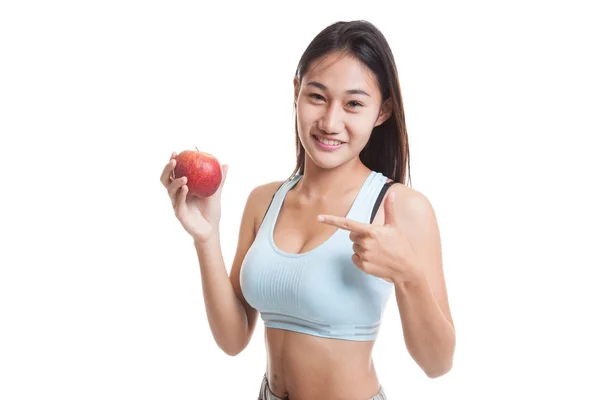Азиатская здоровая девочка указывает на красное яблоко . — стоковое фото