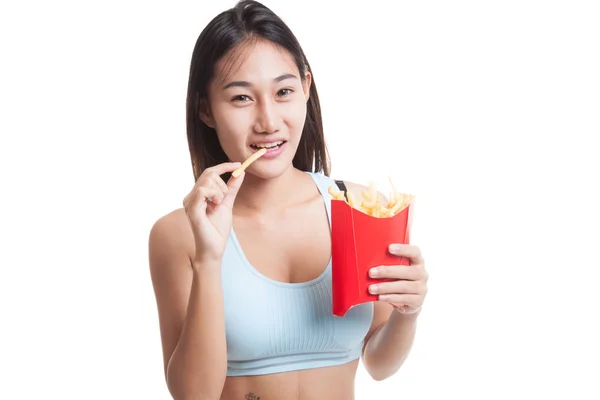 美しいアジアの健康的な女の子を食べるフライド ポテト. — ストック写真