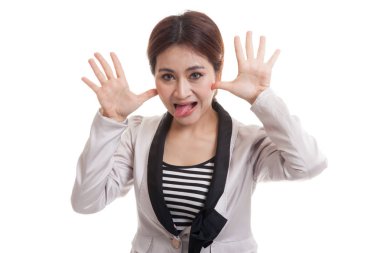 Genç Asyalı kadın dilini yapışkanlık dışarı.