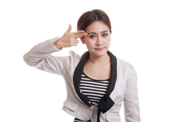 Beautiful young Asian woman holding fingers in gun gesture. — Stock Photo, Image