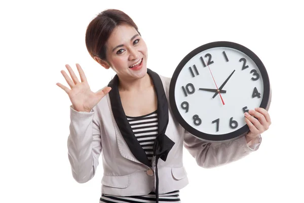 Happy Young Asian business woman with a clock. — Stock Photo, Image