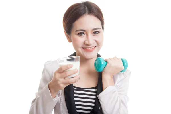 Healthy Asian woman drinking a glass of milk and dumbbell. — Stock Photo, Image