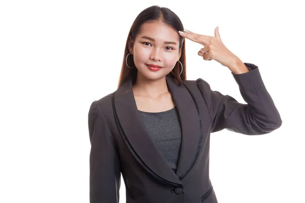 Schöne junge asiatische Frau hält die Finger in Waffe Geste. — Stockfoto