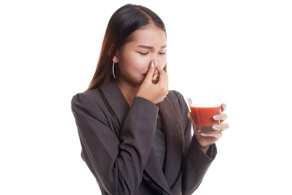 Young Asian business woman hate tomato juice. — Stock Photo, Image