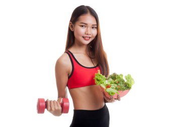 Güzel Asyalı sağlıklı kız dumbbell ve salata ile.