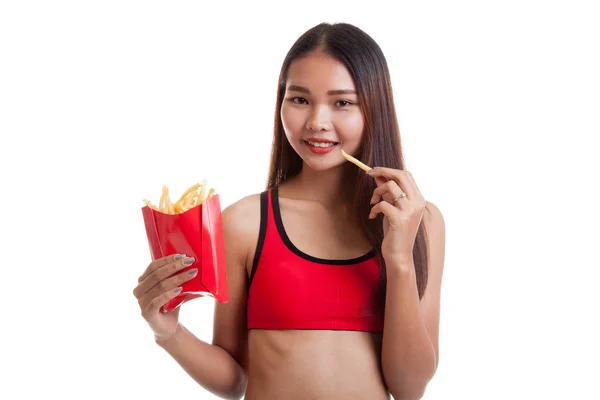 Menina saudável asiática bonita comer batatas fritas . — Fotografia de Stock