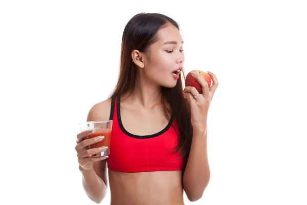 Όμορφα υγιή ασιατικό κορίτσι με χυμό ντομάτας και το μήλο. — Φωτογραφία Αρχείου