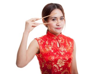 Asyalı kız cheongsam Çin yemek çubukları ile elbise.