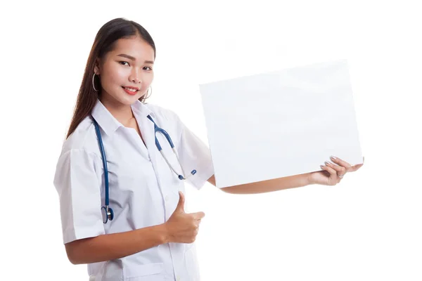 Young Asian female doctor show thumbs up and  blank sign. — Stock Photo, Image