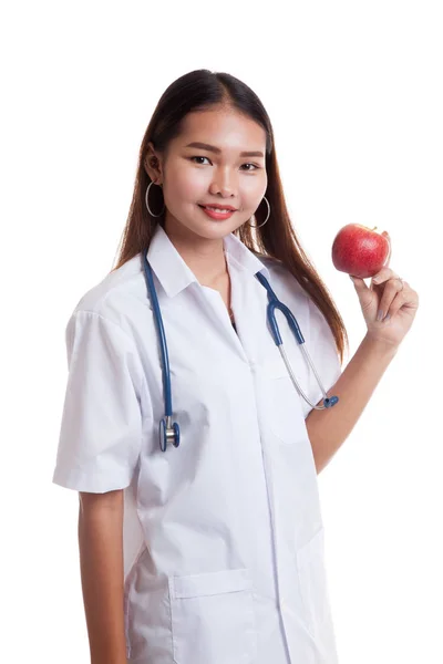 Young Asian female doctor show an apple. — Stock Photo, Image