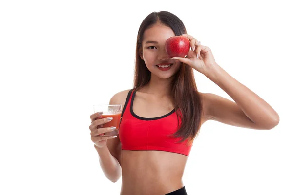 Beautiful healthy Asian girl with tomato juice and apple. — Stock Photo, Image