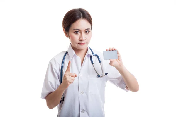 Asian young female doctor show one finger with blank card. — Stock Photo, Image