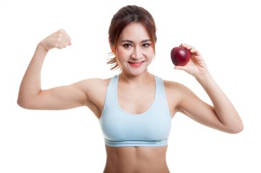 Güzel Asyalı sağlıklı kız pazı apple ile esneme.