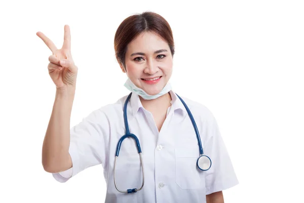 Young Asian female doctor show victory sign. — Stock Photo, Image