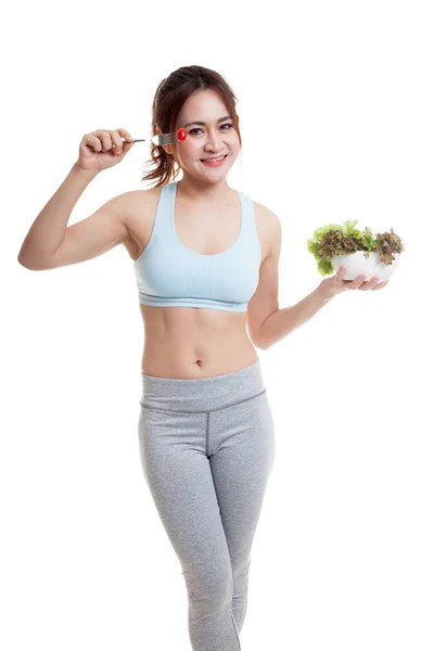 Gyönyörű ázsiai egészséges lány élvezni eszik saláta. — Stock Fotó