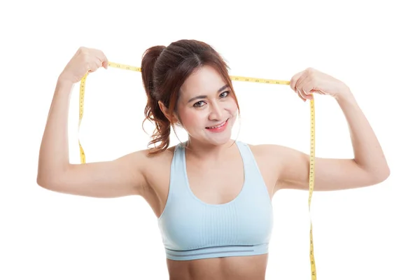 Beautiful Asian healthy girl with measuring tape. — Stock Photo, Image