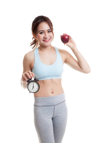 Азиатская здоровая девочка с часами и яблоком . — стоковое фото