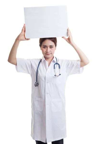 Young Asian female doctor show a blank sign over head. — Stock Photo, Image