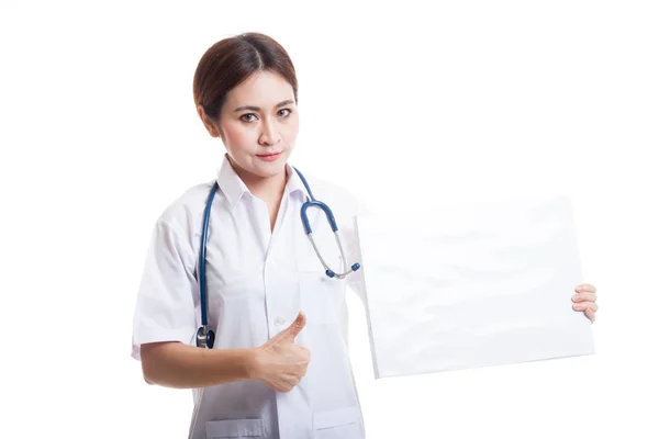 Young Asian female doctor show thumbs up and  blank sign. — Stock Photo, Image