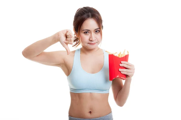 Asiático saudável menina polegares para baixo com batatas fritas . — Fotografia de Stock