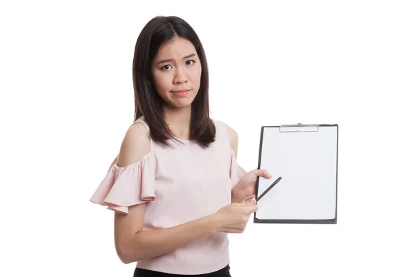 Unhappy Asian business woman point to clipboard with pen. — Stock Photo, Image