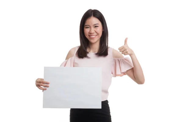 Young Asian business woman show thumbs up with  white blank sign — Stock Photo, Image