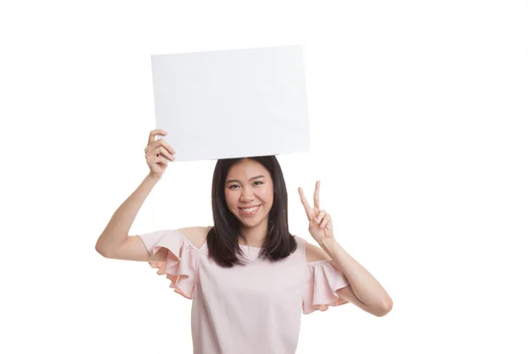 Young Asian business woman show victory sign with blank sign. — Stock Photo, Image