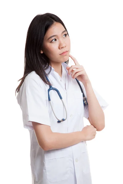 Asijské mladý lékař ženské myšlení, vyhledávání. — Stock fotografie