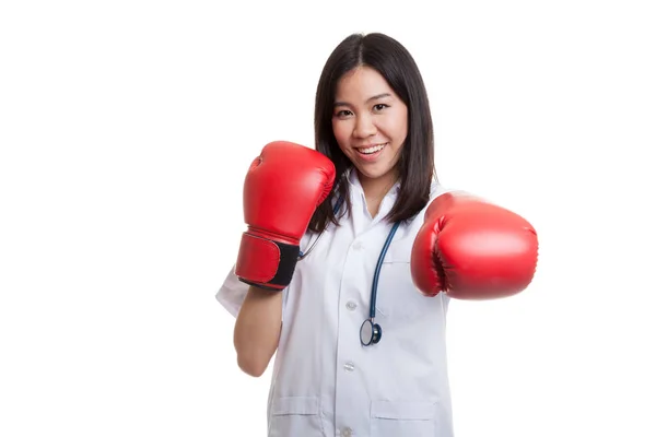 Young Asian female doctor punch with boxing glove. — Stock Photo, Image